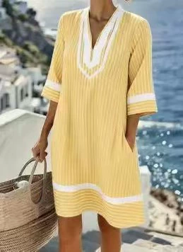 Striped dress, a must-have for summer travel and leisure.