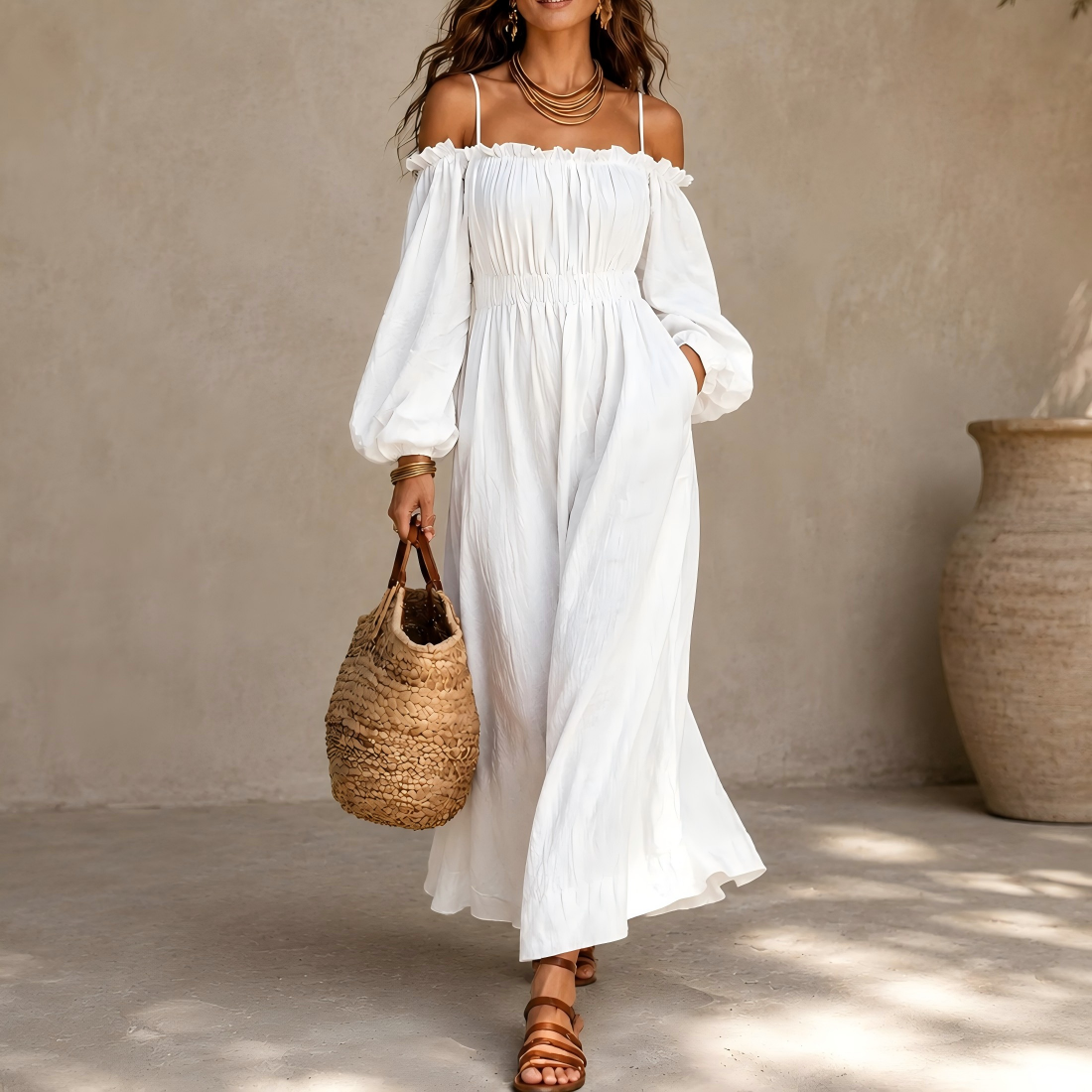 Sweet off-shoulder camisole-style dress with a fitted waist and pockets.