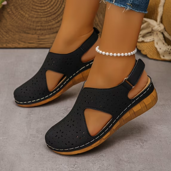 Women's breathable sandals with arch support and orthopedic design.