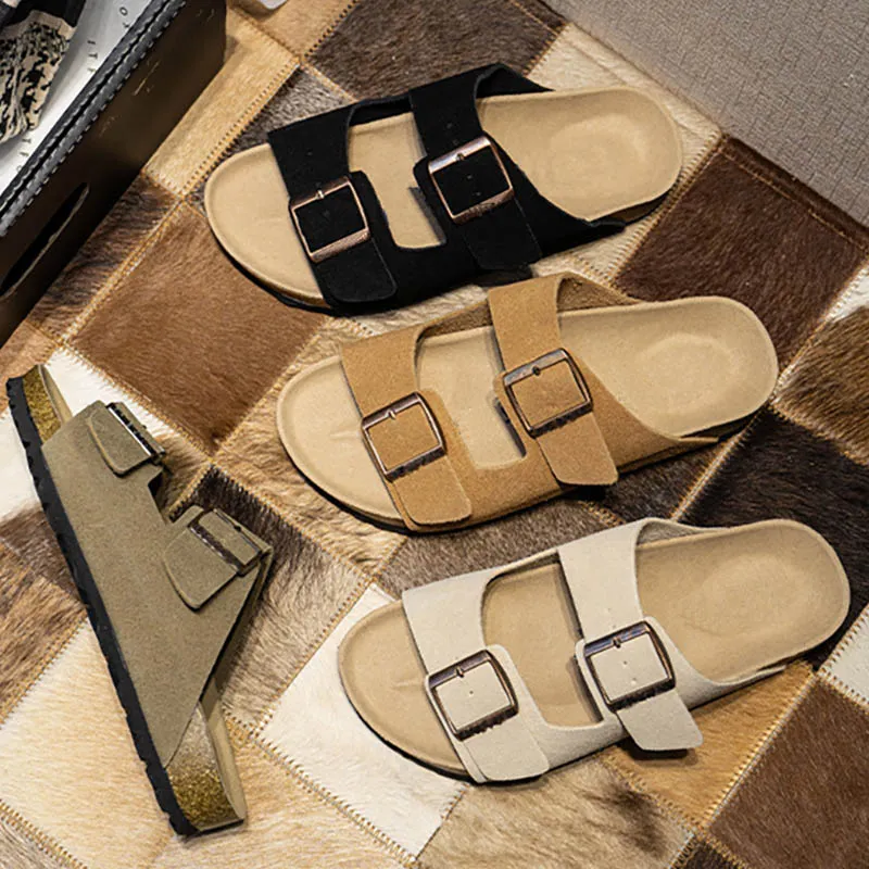 Women's sandals featuring a contoured cork sole that molds to the foot, with an adjustable double-buckle design.