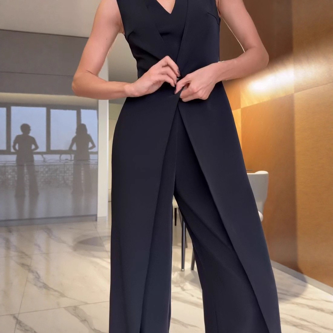 Elegant Black Sleeveless Deep V-Neck Fitted Jumpsuit