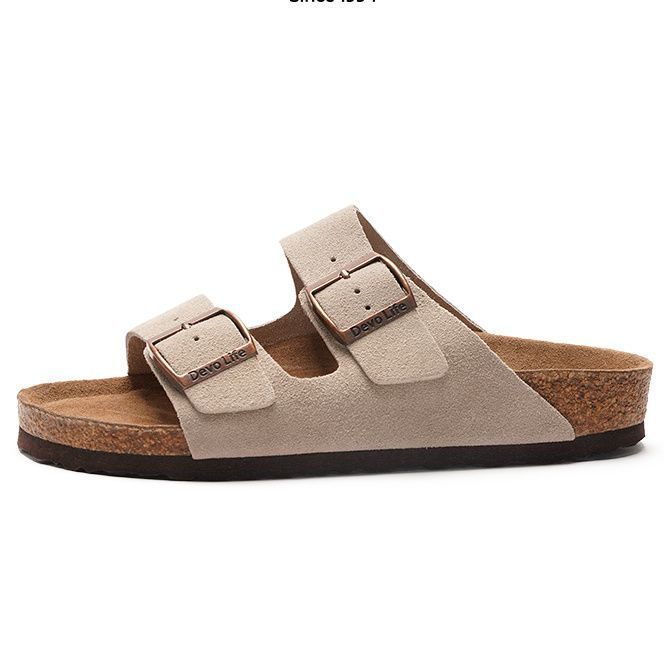 Women's sandals featuring a contoured cork sole that molds to the foot, with an adjustable double-buckle design.