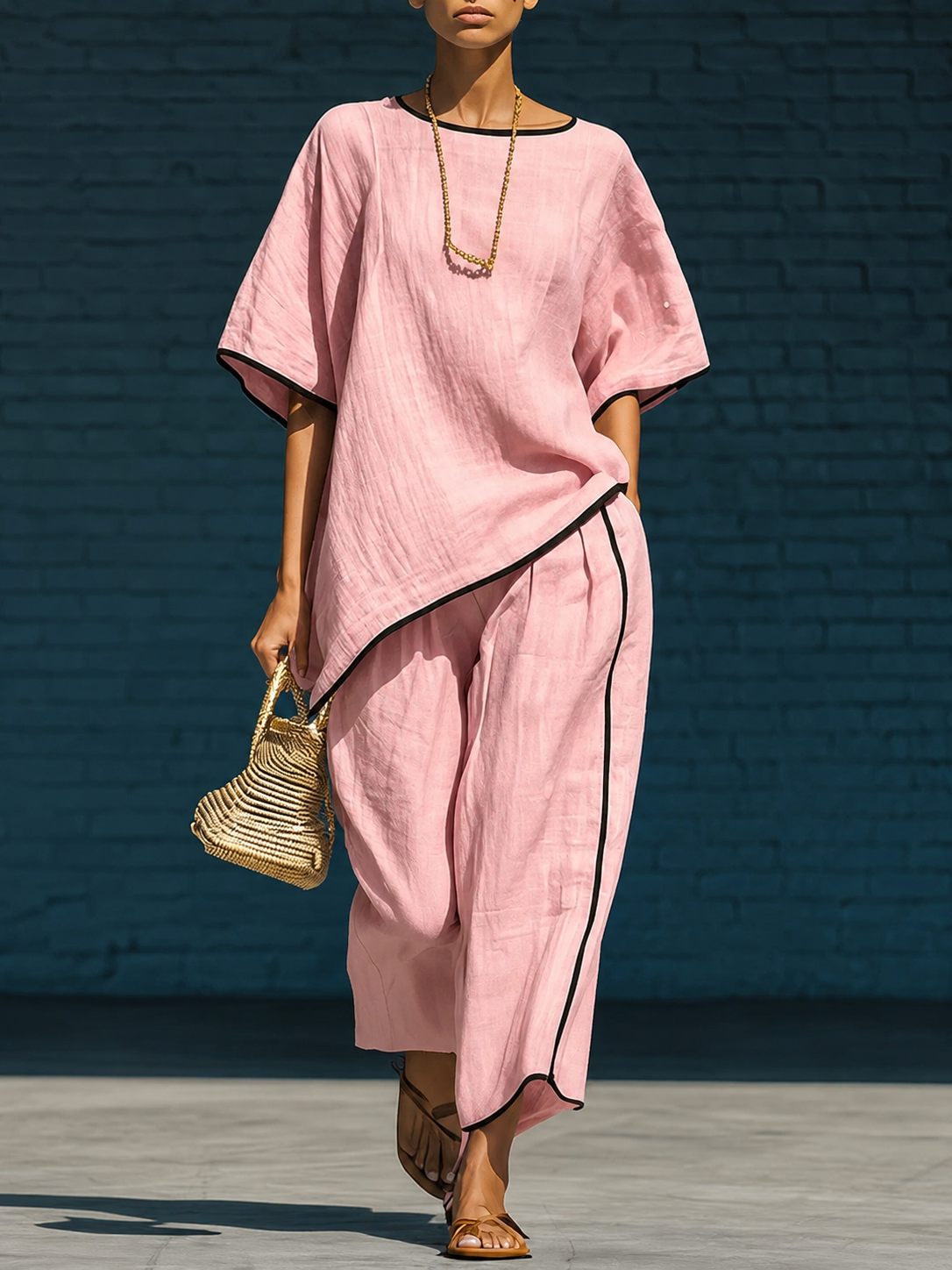 Minimalist blue irregular-hem top and wide-leg trousers set