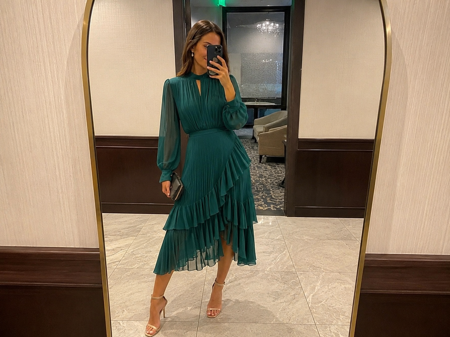 Customer wearing the dark green dress