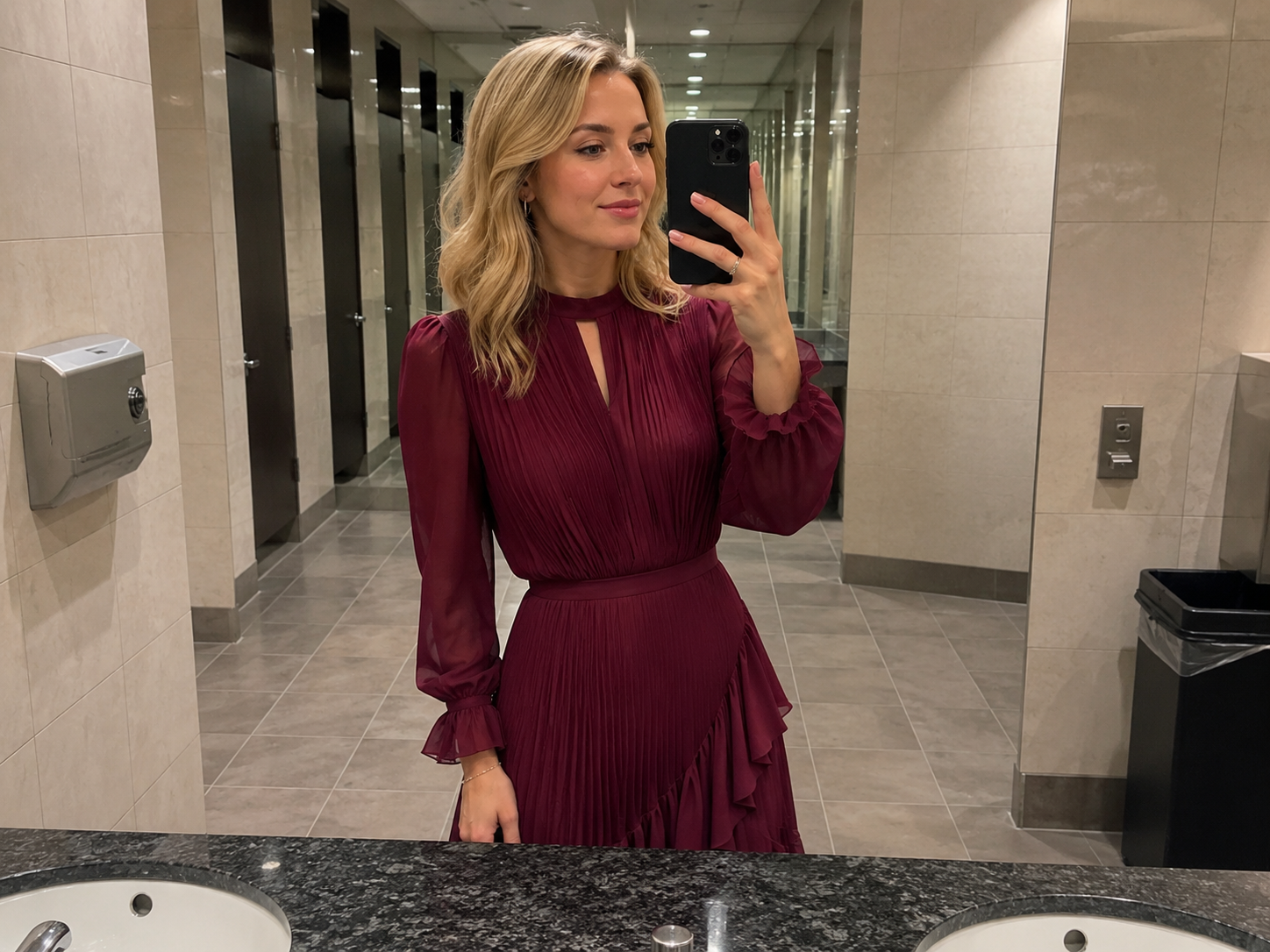 Customer wearing the burgundy dress