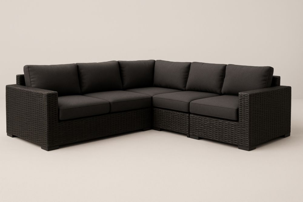 Canapé d'angle modulable en résine tressée coussins tissu noir-stylonesto