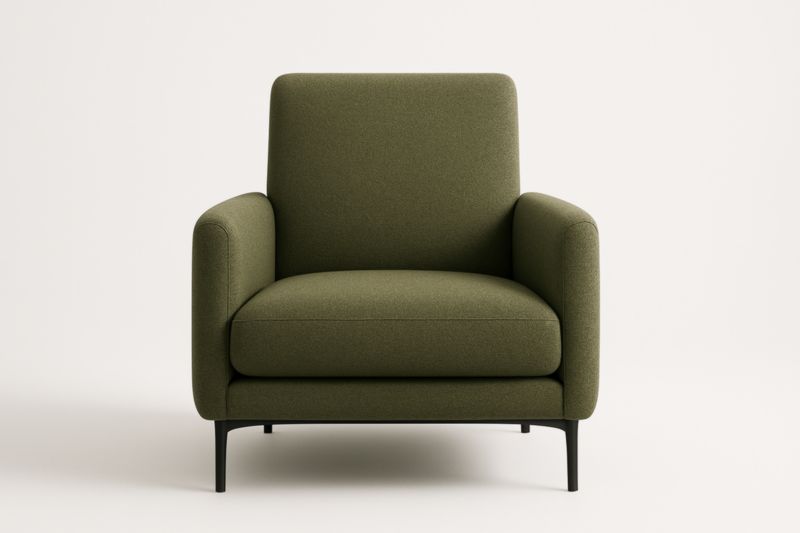 Fauteuil en tissu vert avec structure en acier