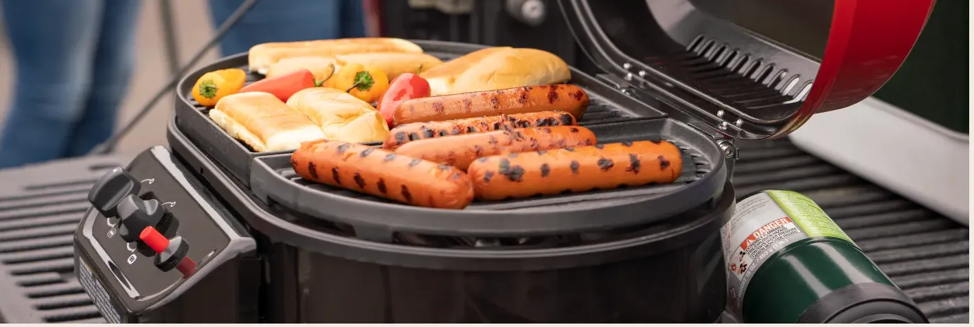coleman grill hot dog buns peppers tailgate backyard party friends family dinner lunch easy gas lid