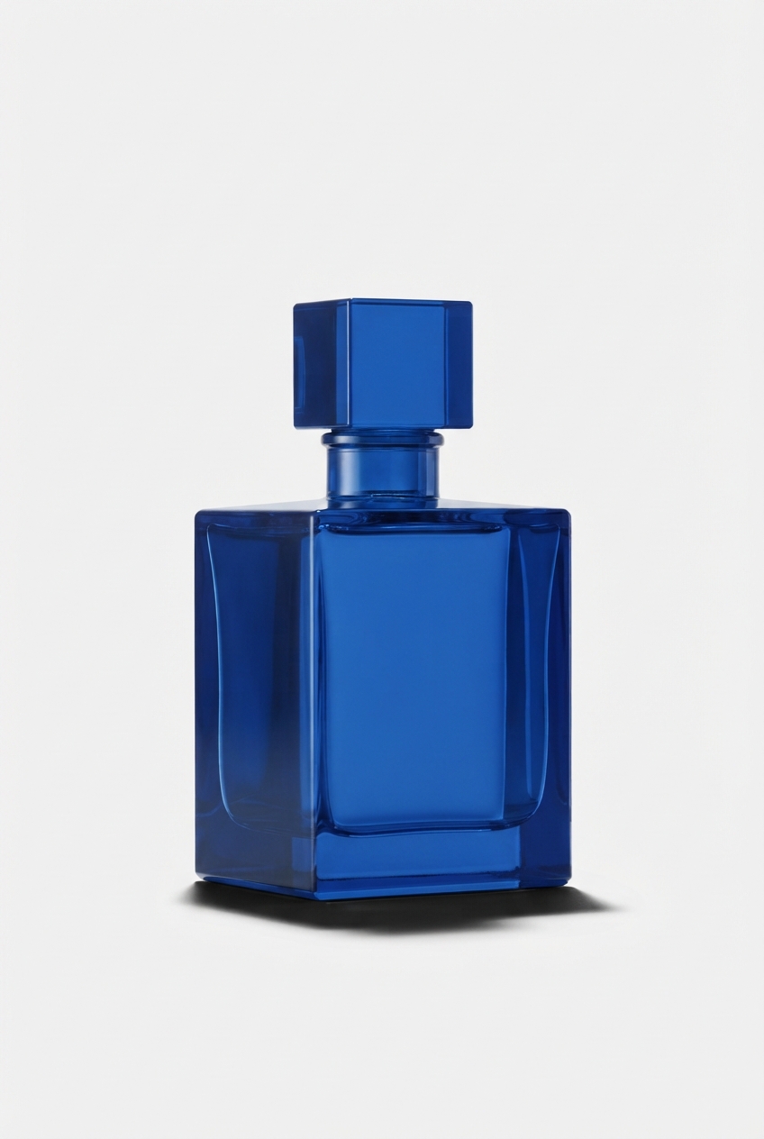 Blue men's sport fragrance bottle on neutral backdrop