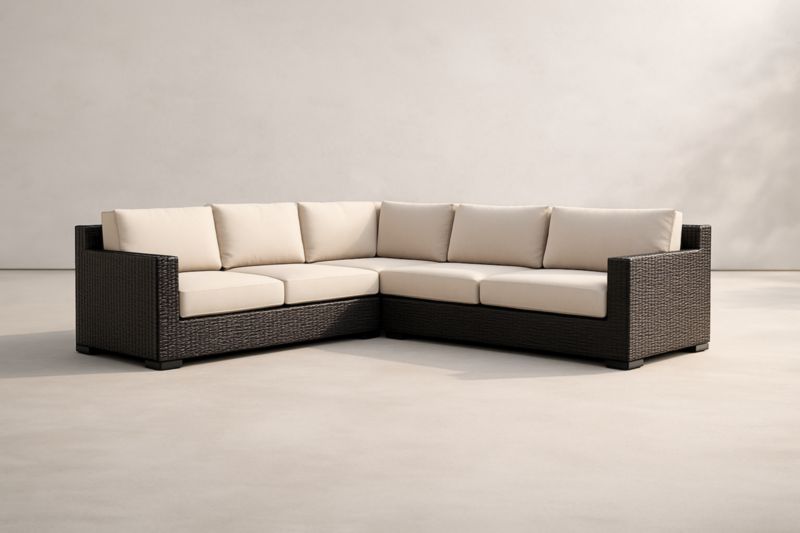 Canapé d'angle extérieur en résine tressée avec coussins beiges