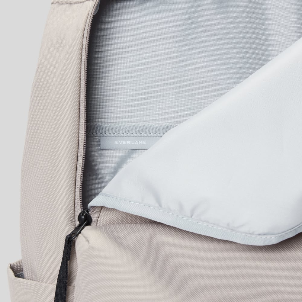 The ReNew Transit Backpack | Warm Quartz (with label)-styoma