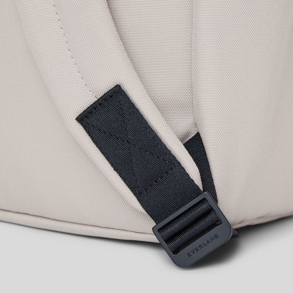 The ReNew Transit Backpack | Warm Quartz (with label)-styoma