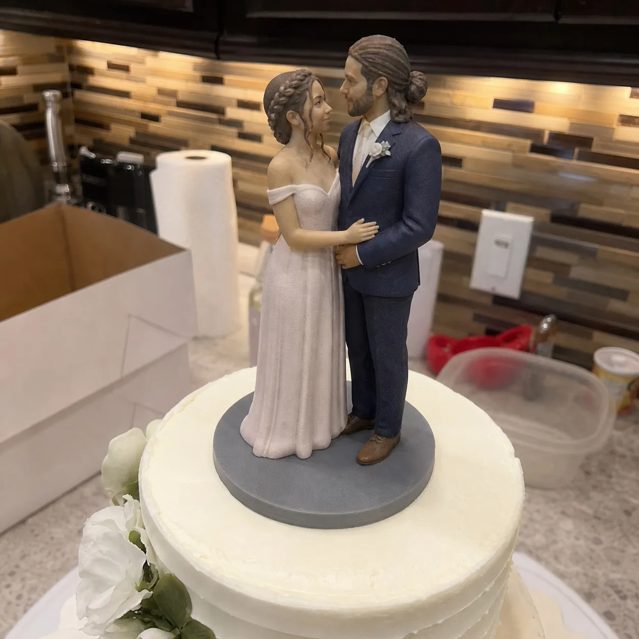 Custom wedding topper figurine with couple display styling