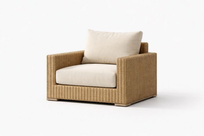 Fauteuil en rotin synthétique beige avec coussins en polyester
