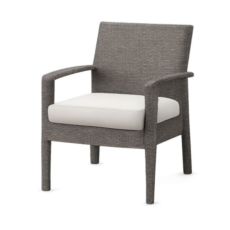 Chaise en rotin gris avec coussin blanc