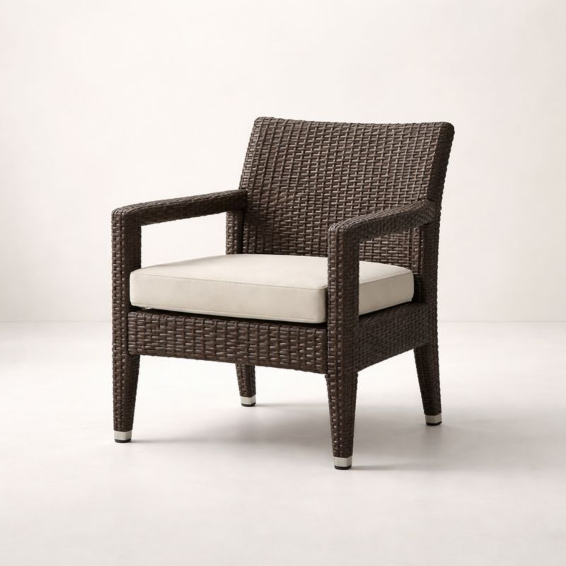 Fauteuil en osier synthétique marron avec coussin beige