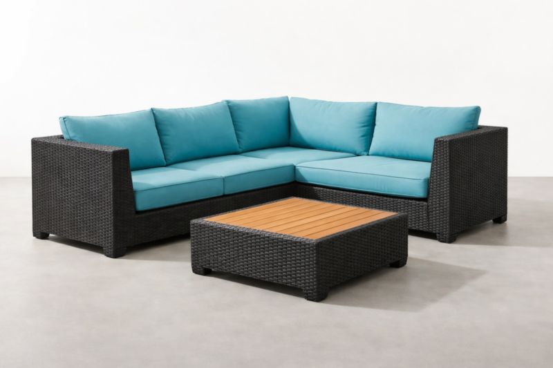 Set Divano Angolare da Giardino in Rattan con Cuscini Azzurri e Tavolino
