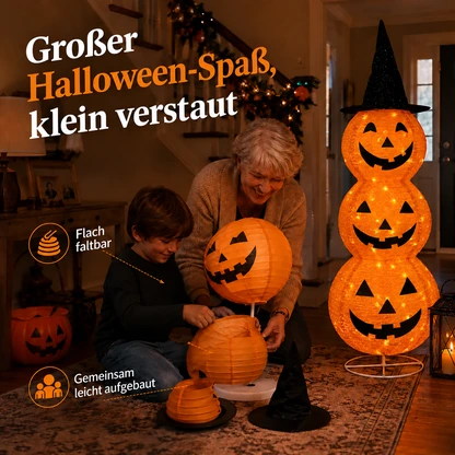 Beleuchteter dreistöckiger Kürbislaternen-Stapel mit Hexenhut