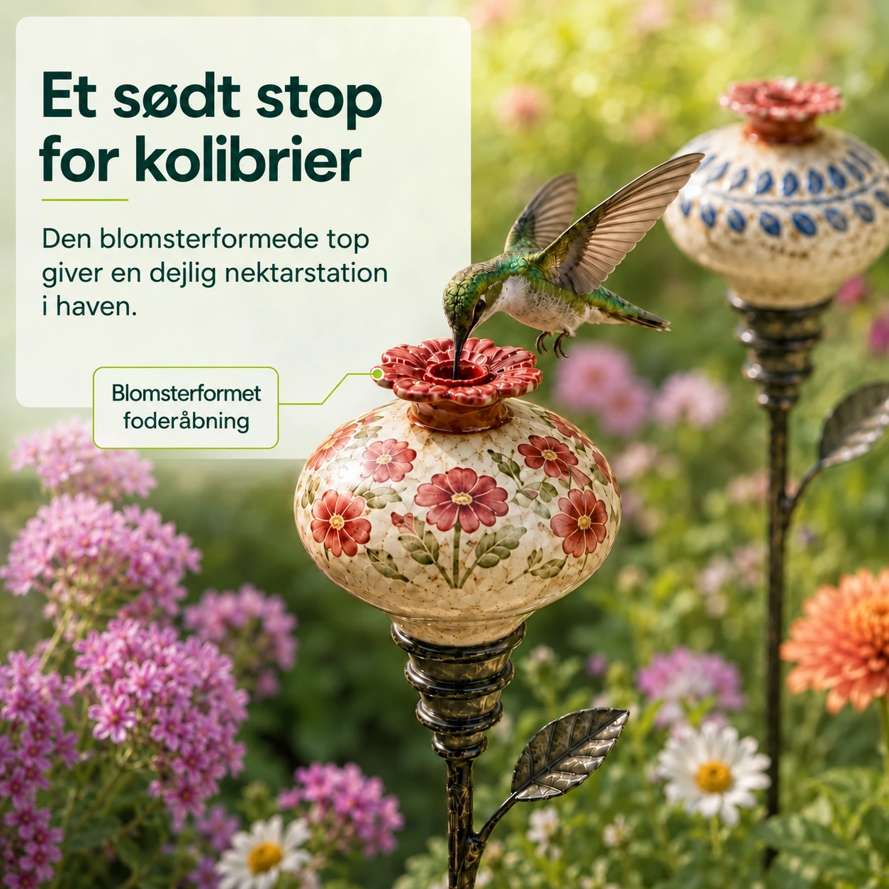 Håndmalet kolibrifoderstation i keramik på havepind