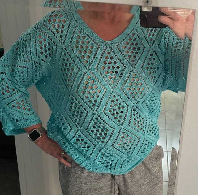 Absolutely adorable! I can't wait to wear it on my cruise! I am thinking of wearing a white halter tank under it!