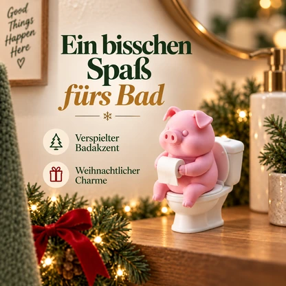 Lustige Schweinefigur auf der Toilette – weihnachtlicher Badakzent