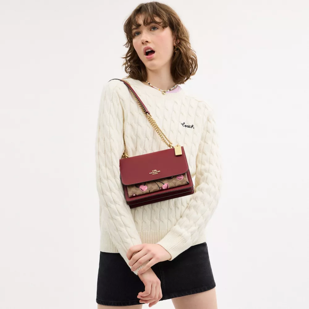 Klare Crossbody Bag In Signature Canvas With Cherry Print