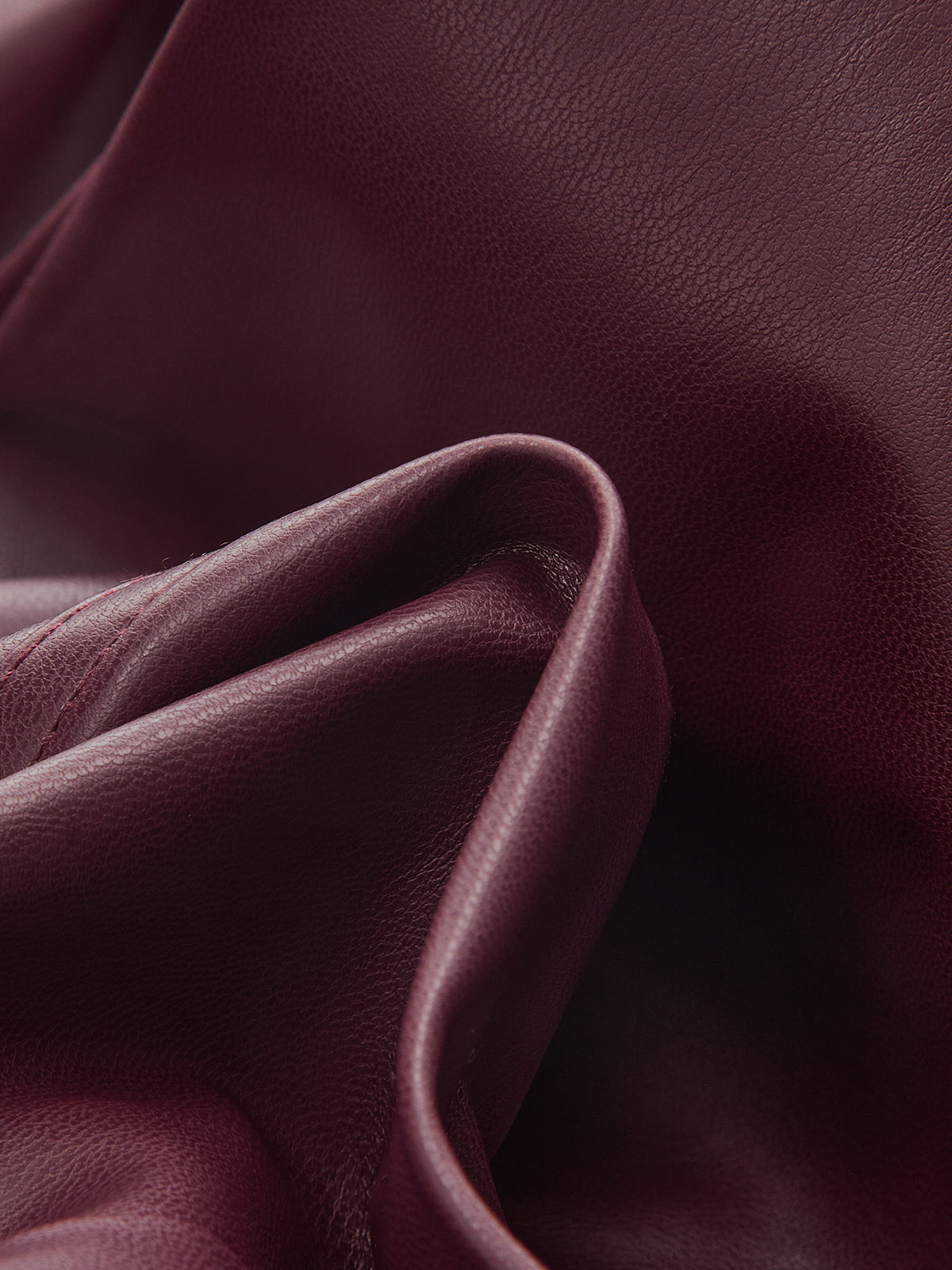 Mid-Waisted Faux Leather Curved-Leg Pants-Chicvia