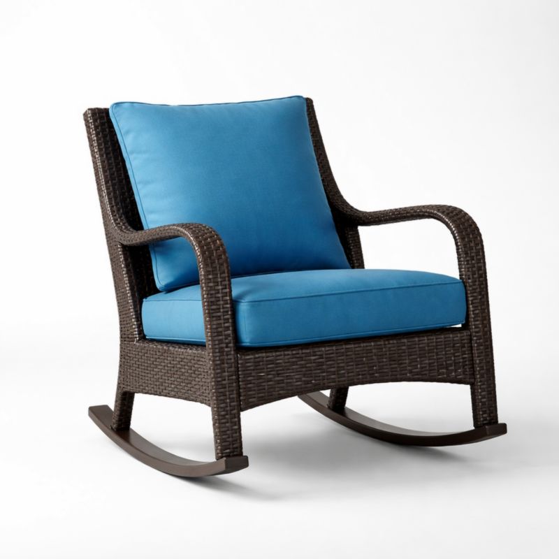 Fauteuil à bascule en résine tressée avec coussins bleu