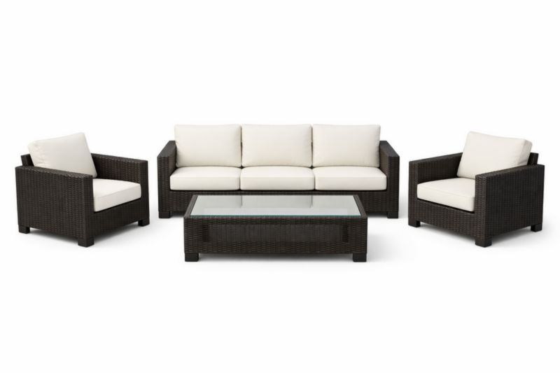 Set salotto giardino 4 pezzi in rattan sintetico marrone con cuscini crema e tavolino in vetro