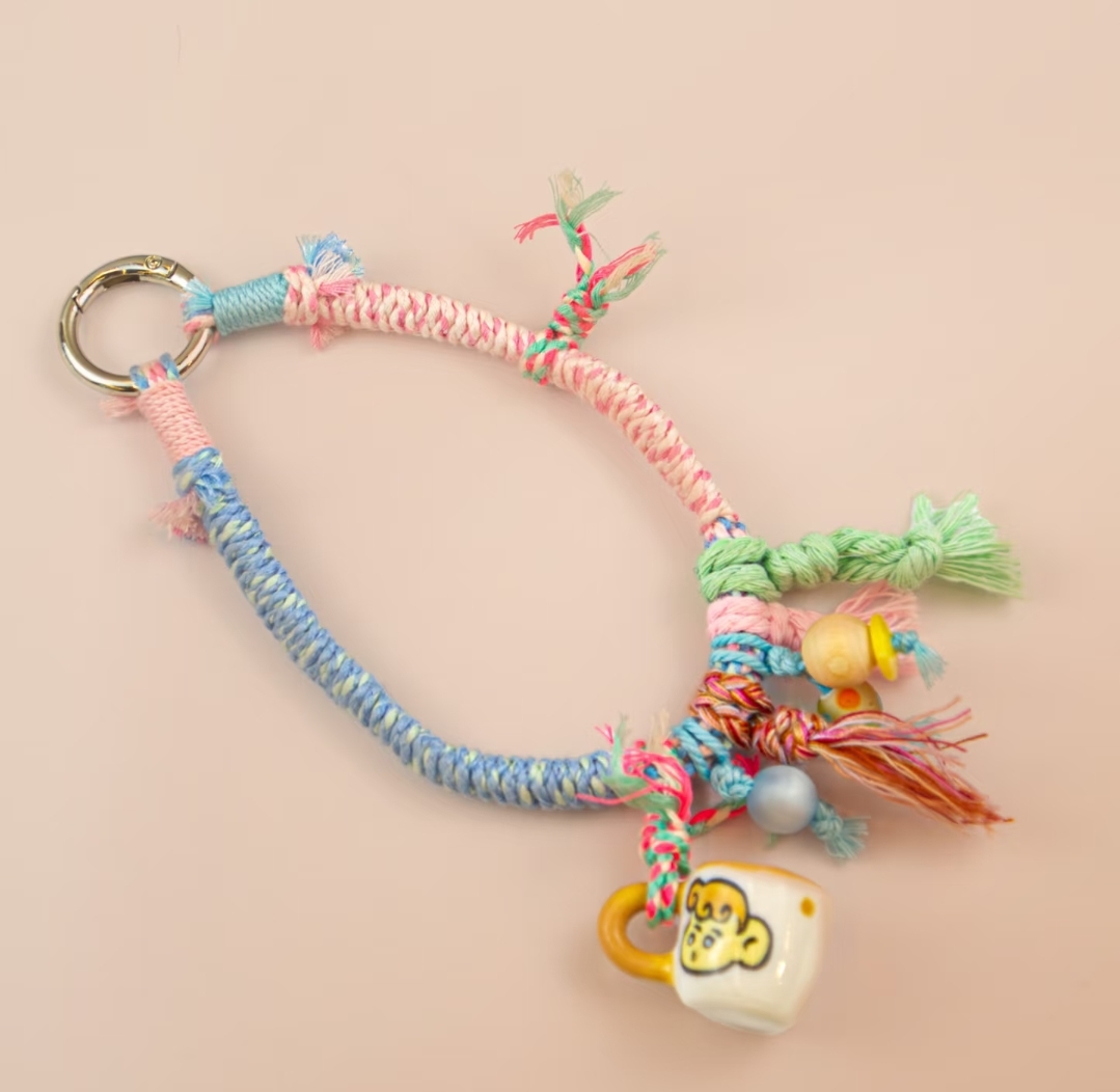 Handwoven phone lanyard charm for hand carrying