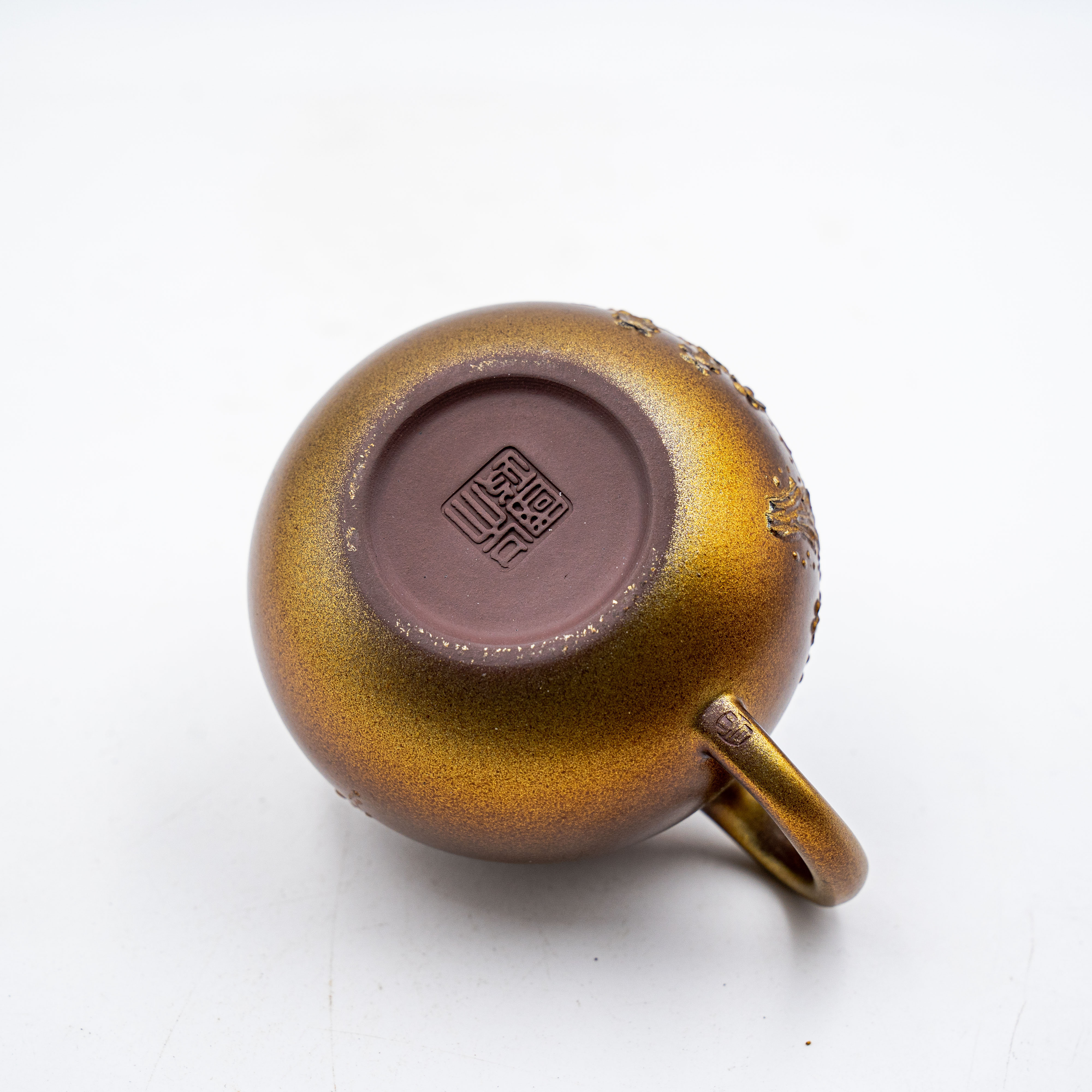 Handcrafted Yixing Longxue Sand Qieguo Teapot with Carved Plum Blossom Design