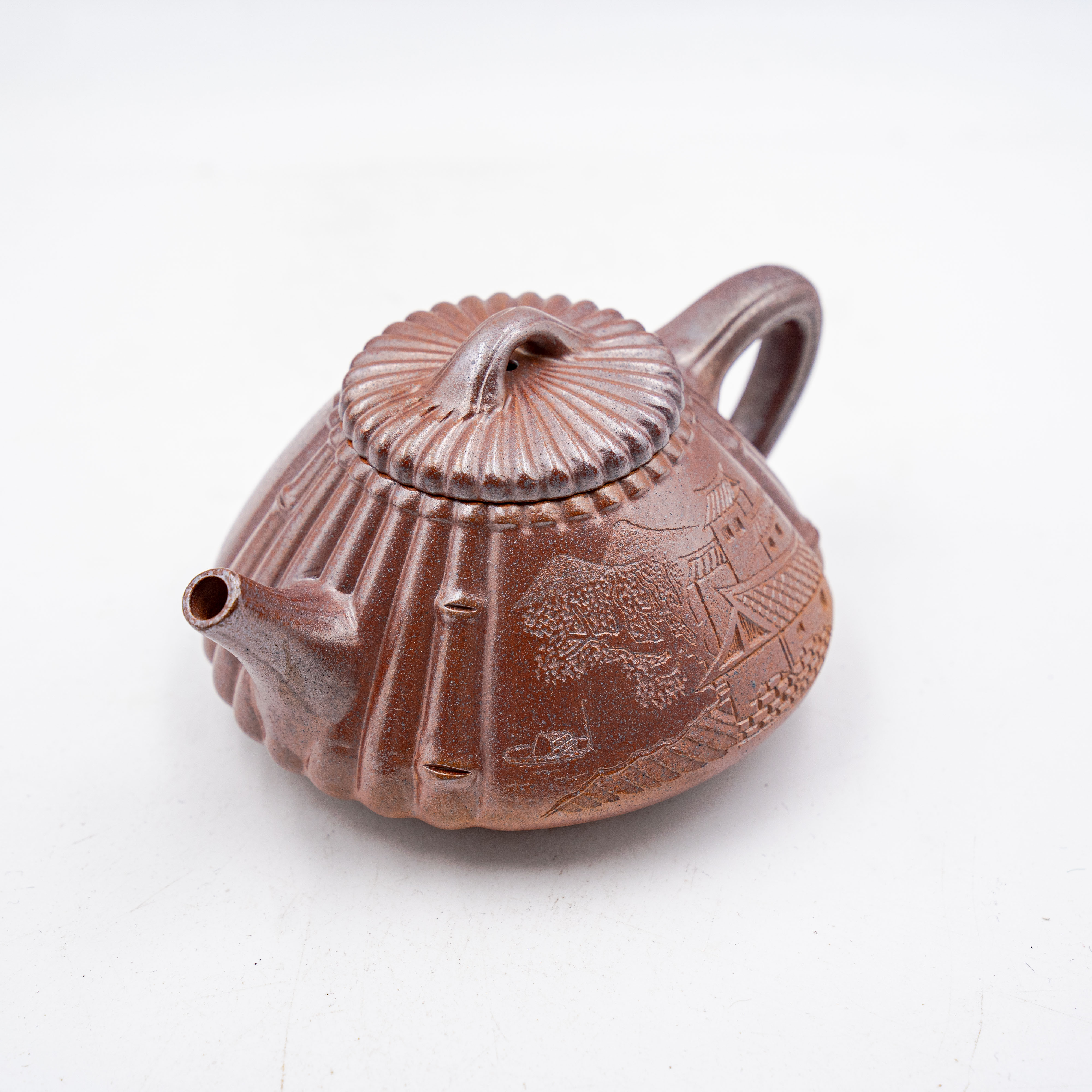 Handcrafted Yixing Zisha Clay Jinsuo Shipiao Teapot with Carved Landscape Design