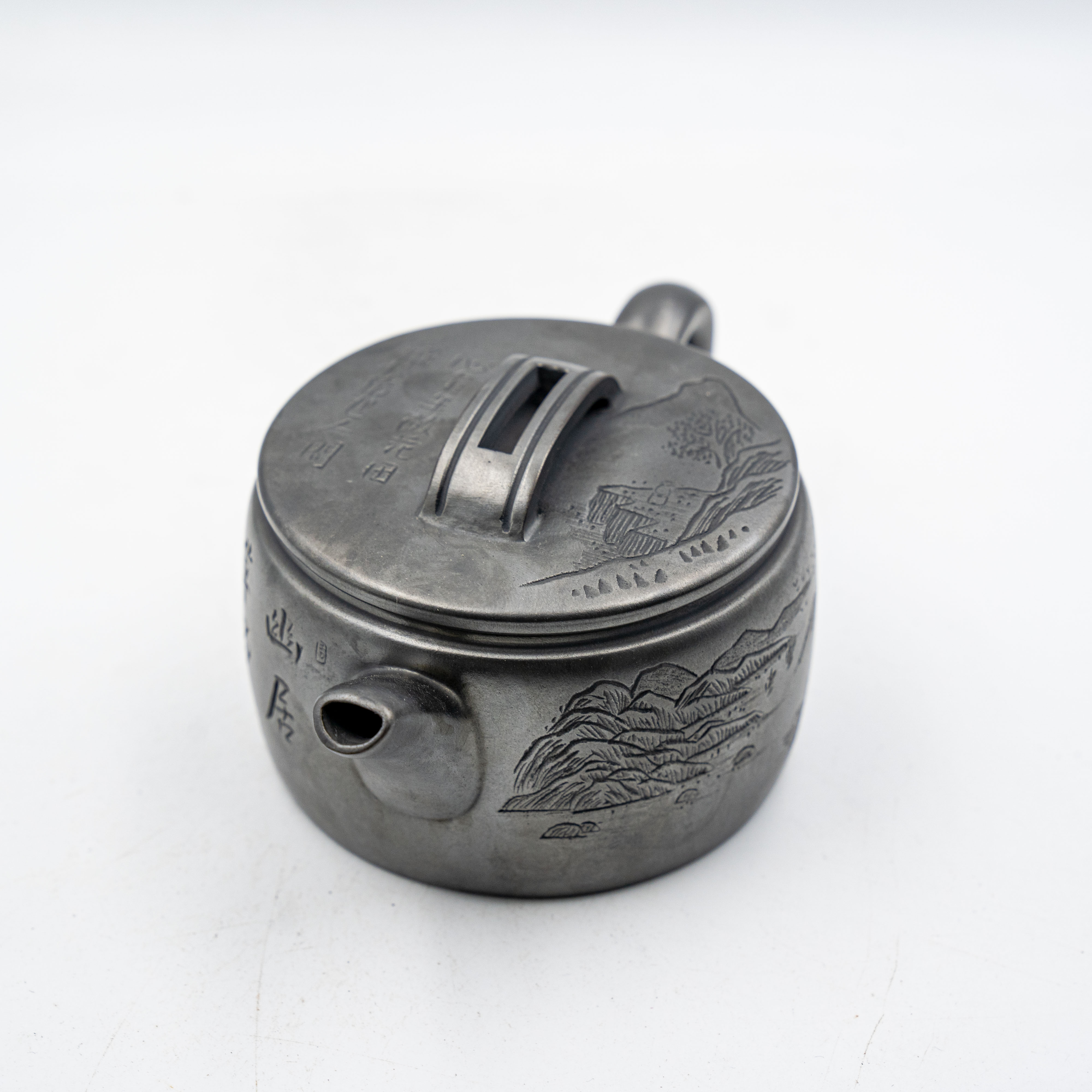 Handcrafted Yixing Xuan Tie Shi Huang Clay Hanwa Teapot with Carved Landscape Design