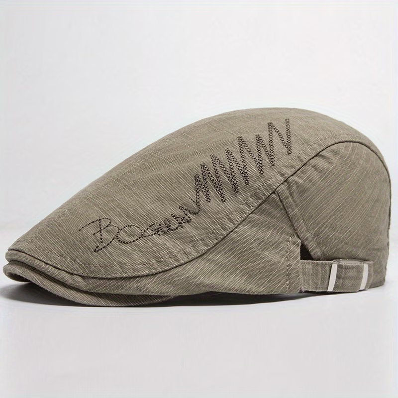 Khaki men's flat cap with embroidered lettering and adjustable strap