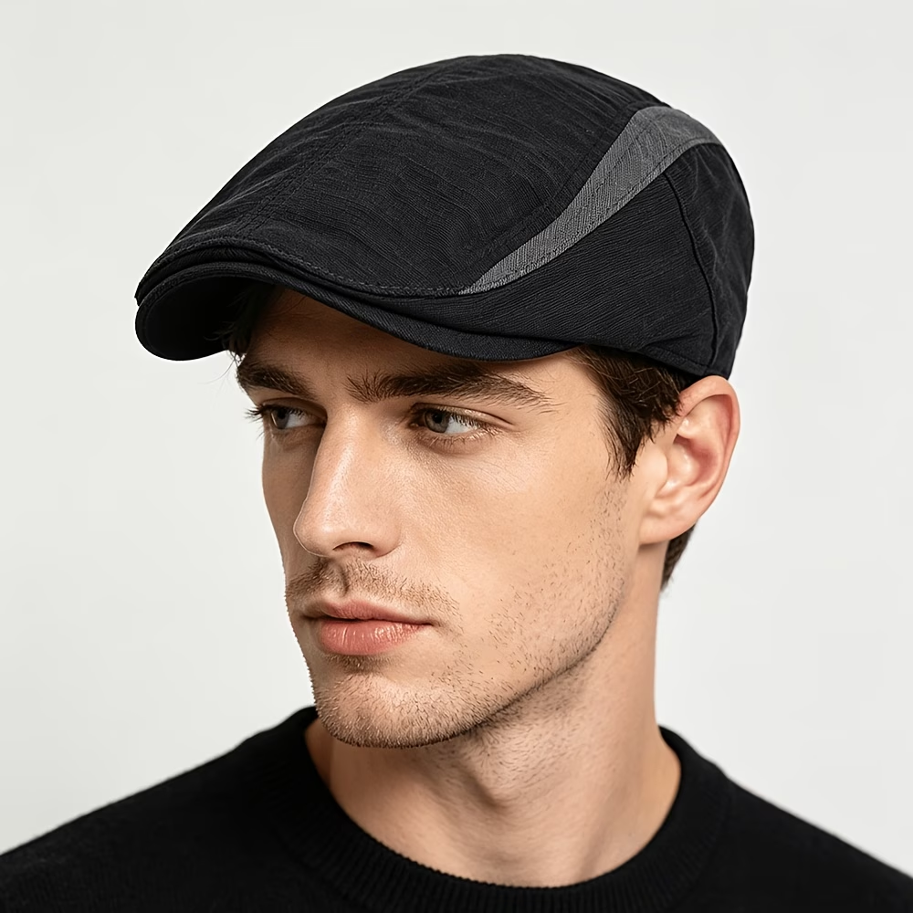 Men wearing a black contrast-stripe flat cap