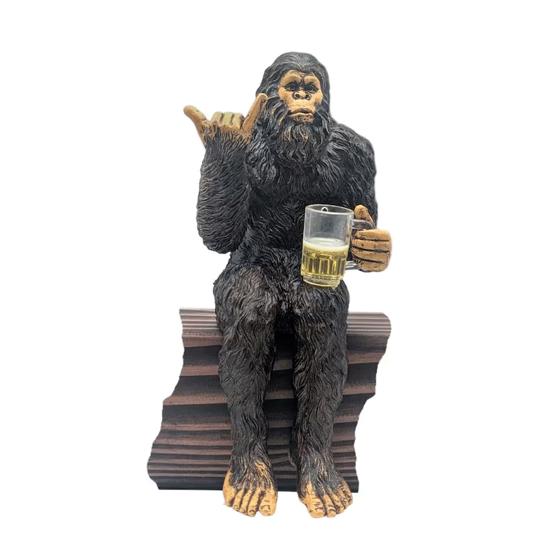 Party is drinking beer Bigfoot Yeti statue