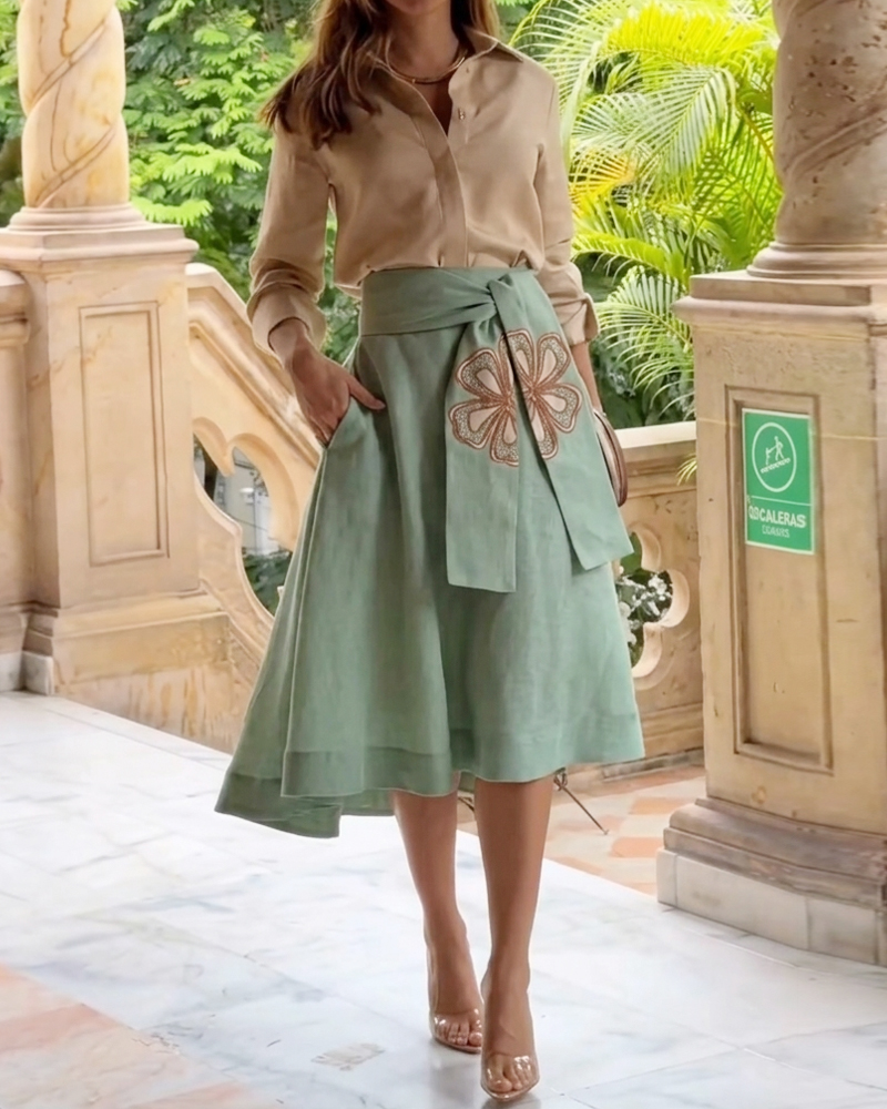 Two-piece set: collared solid color top + printed casual skirt
