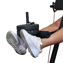 a person holding a dumbbell on a machine