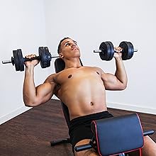 man doing a bench press exercise