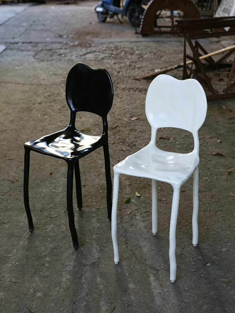 Surrealist minimalist fluid-shaped handmade solid wood melting chair