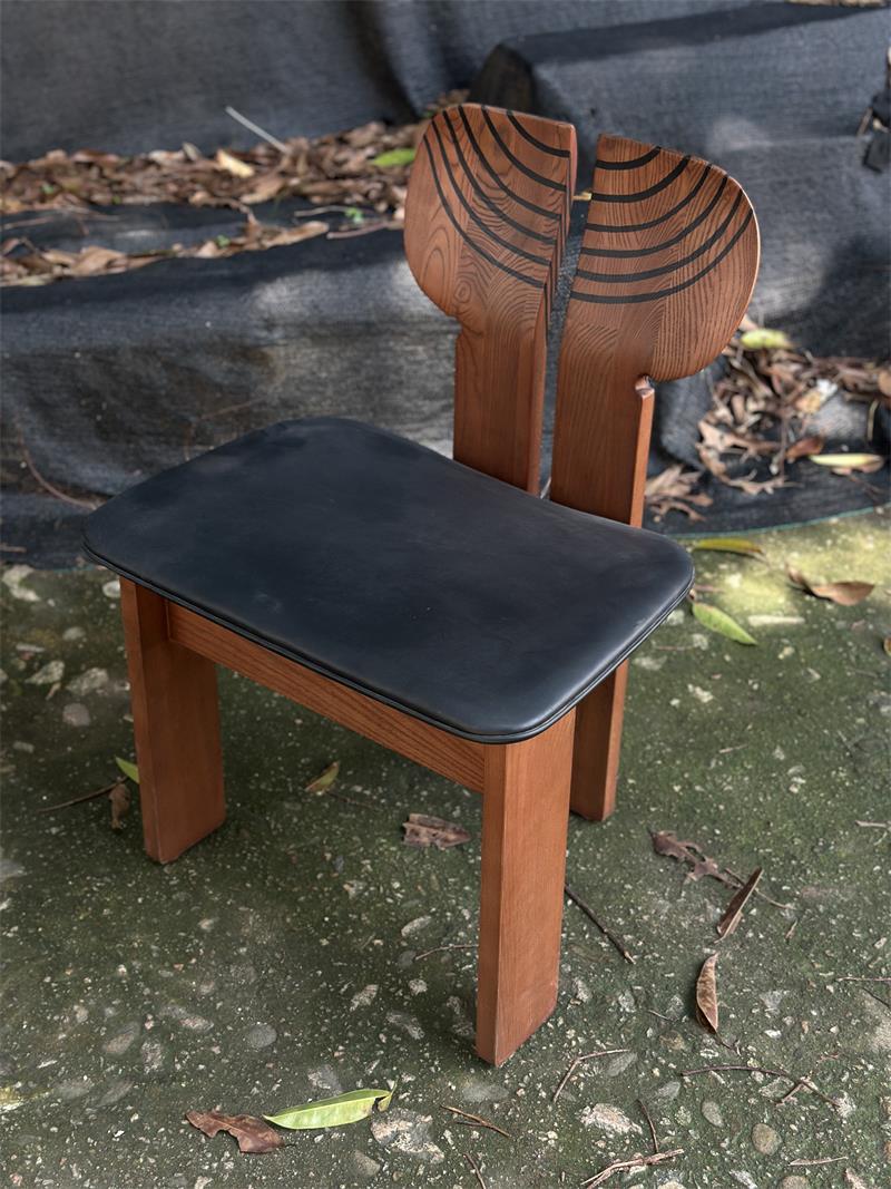 Vintage-style artistic solid wood African chair