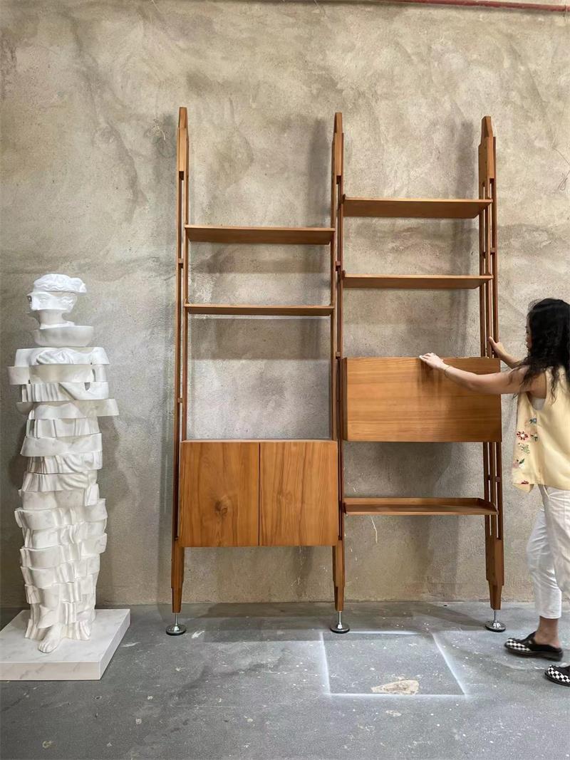 Medieval-style wooden trapezoidal shelving unit wall-mounted bookshelf