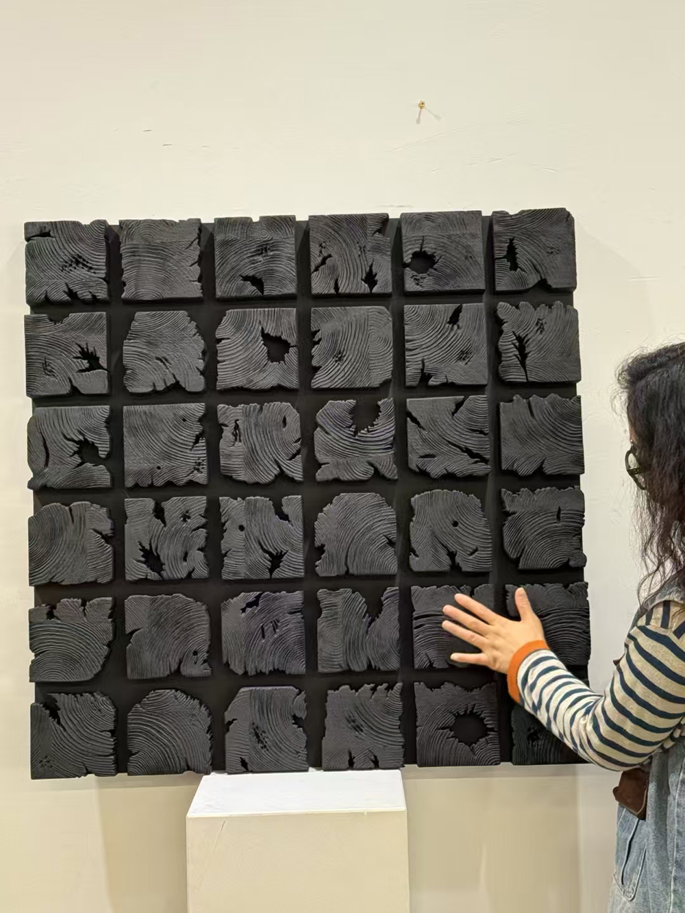 Black wooden blocks wall decor 