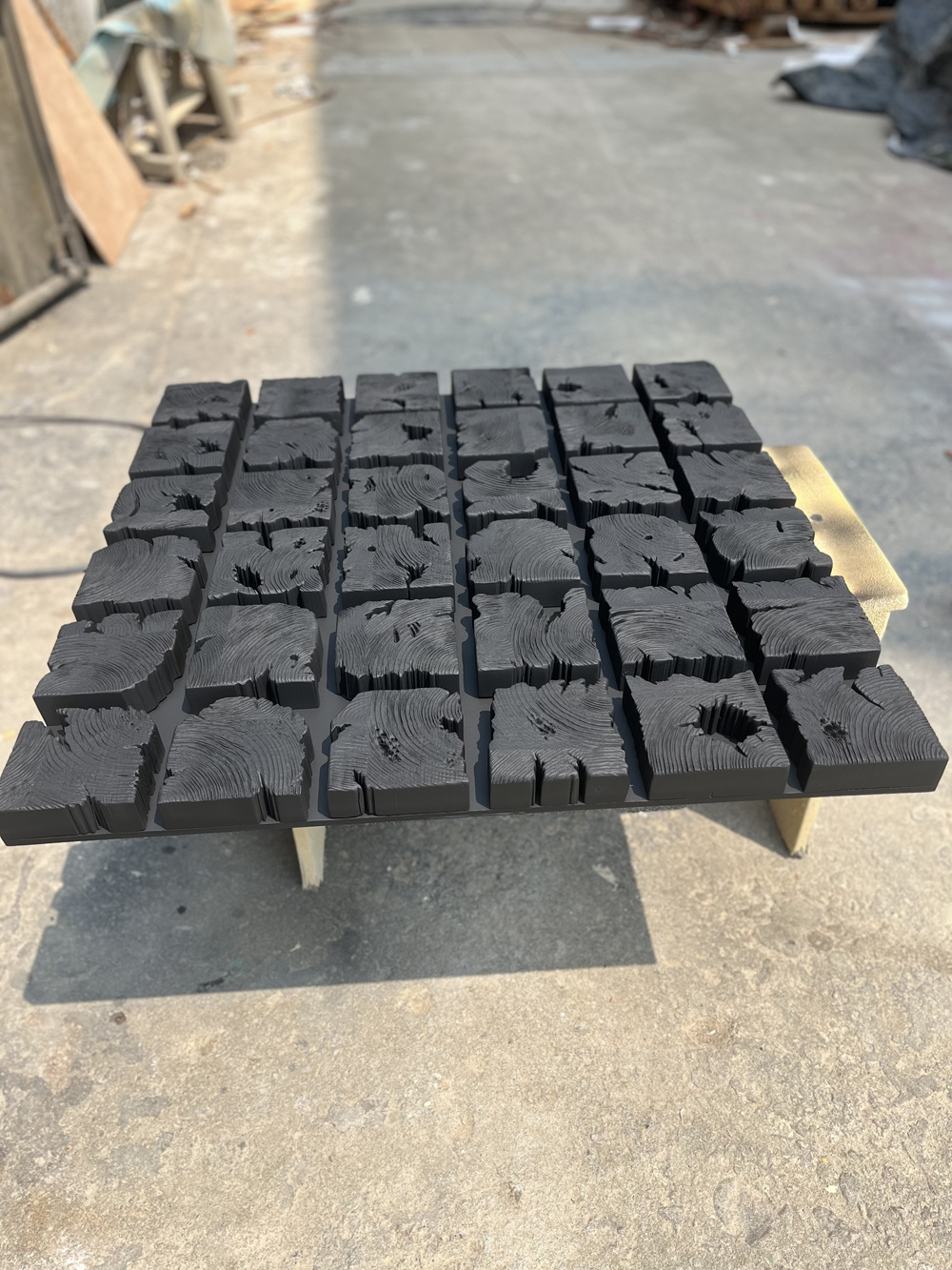Black wooden blocks wall decor 