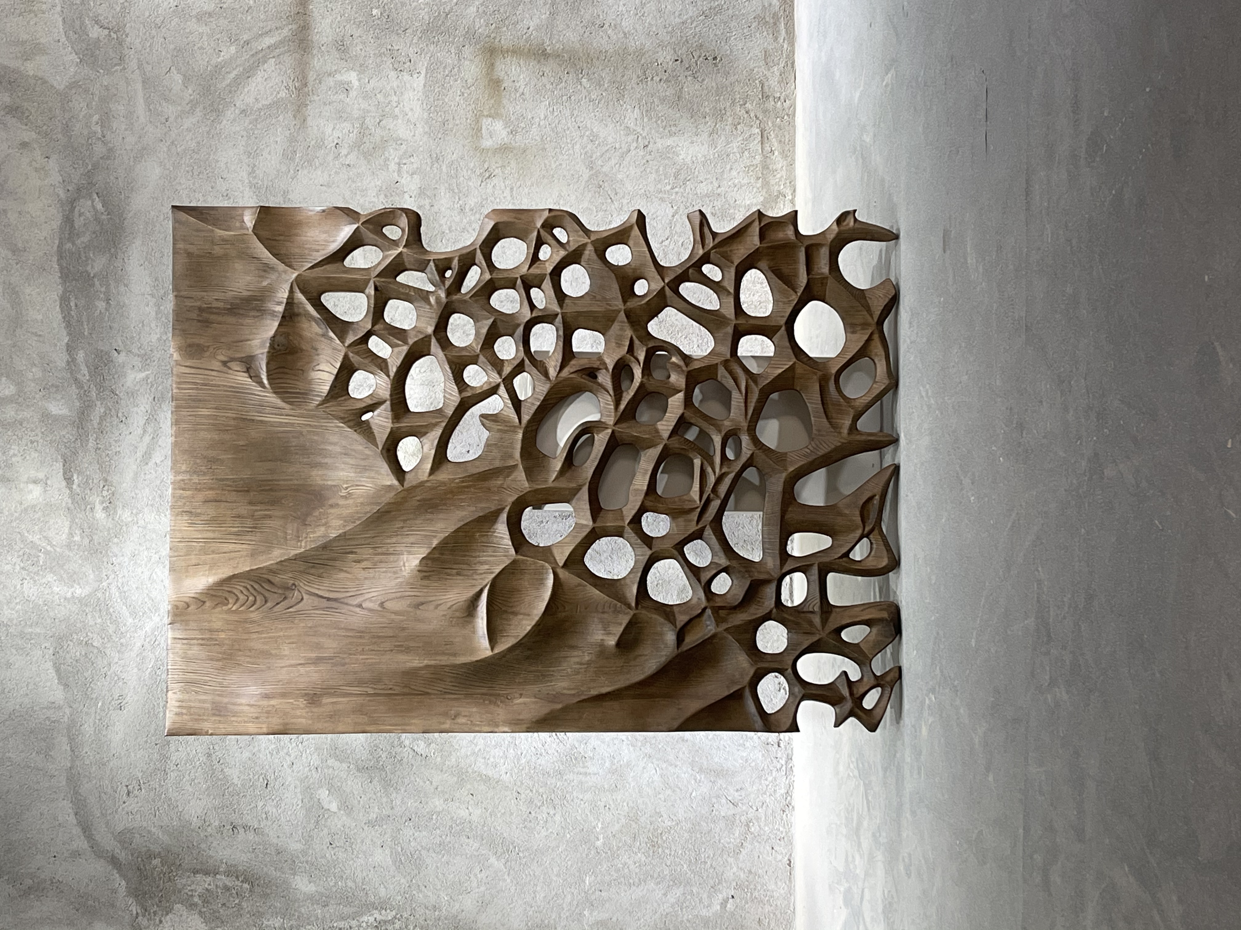 Hand-carved wooden wall sculpture