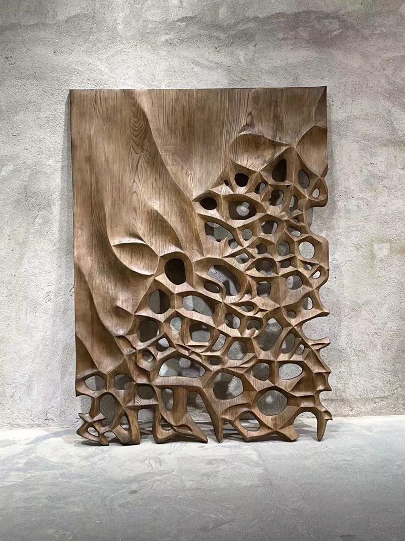 Hand-carved wooden wall sculpture