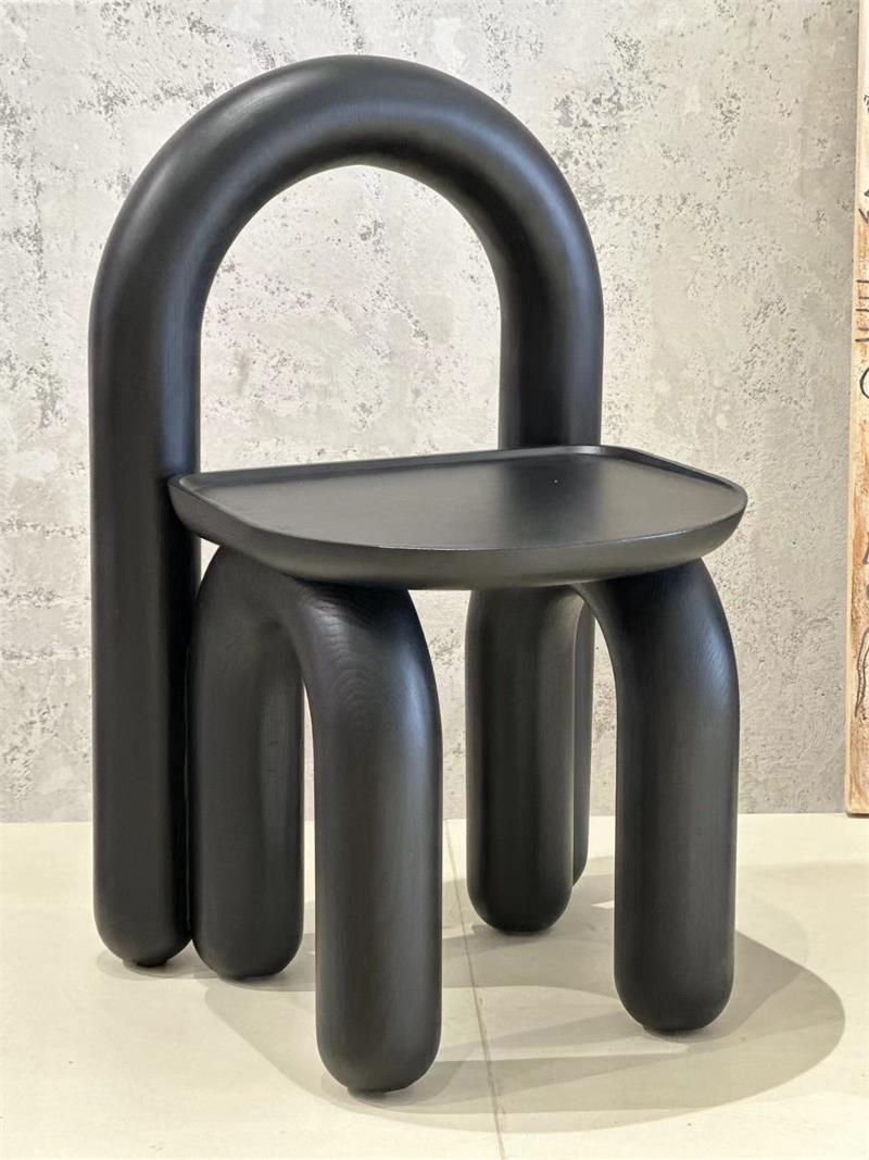 Organic modern hand-carved solid wood chubby arched small chair