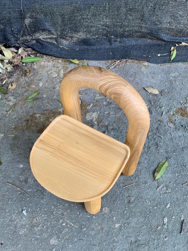 Organic modern hand-carved solid wood chubby arched small chair