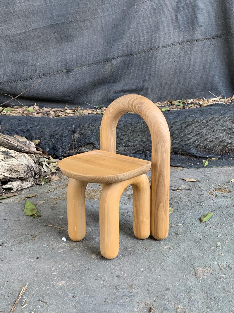 Organic modern hand-carved solid wood chubby arched small chair