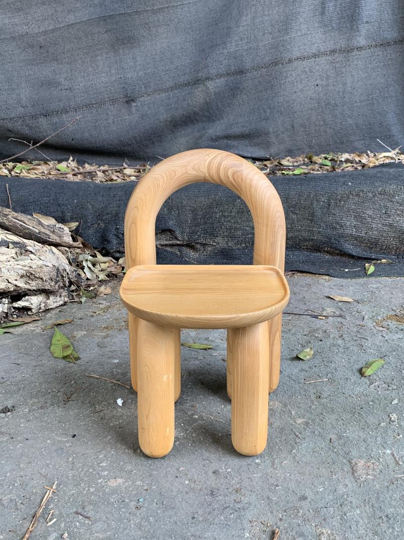 Organic modern hand-carved solid wood chubby arched small chair